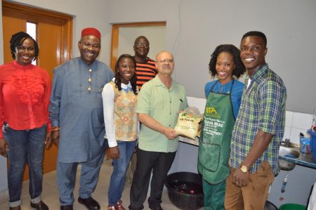 Picture of DDG with the Agripreneurs showing off some of the products.