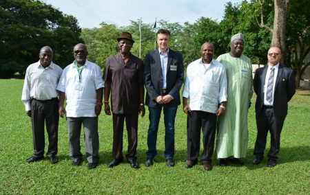 Picture of top officials of the Bill & Melinda Gates Foundation and IITA top management in a group photo.
