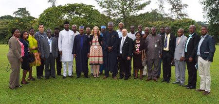 Picture of the Minister of State for Environment and his officials in a group photo with IITA staff.