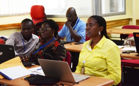 Picture of participants learning how to make good presentations using PowerPoint is a basic skill in the workplace today.