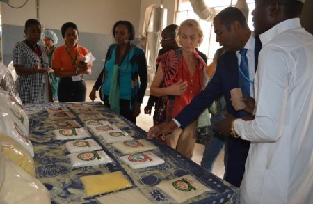 Picture of World Food Programme representatives taking a look at some cassava products in IITA.